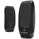 Two black, sleek computer speakers stand upright, featuring fabric grilles and front-facing volume and mute controls on the larger unit, against a plain white background.