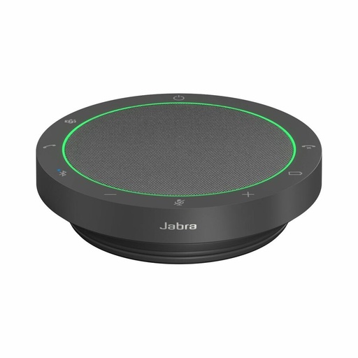 A black in-ceiling speaker with green clamps has its round white mesh grille detached and positioned below it, against a black background.