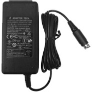 A black rectangular power adapter with a coiled cable extending from one end, terminating in a multi-pin circular connector.